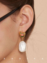 wearing Floral Pearl Earrings